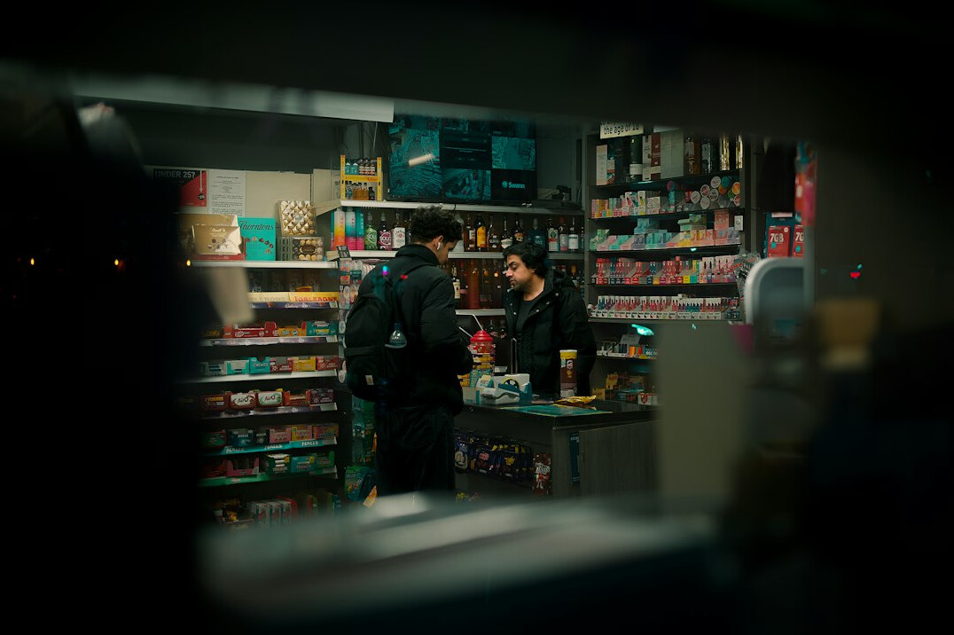 store detective catching shoplifter